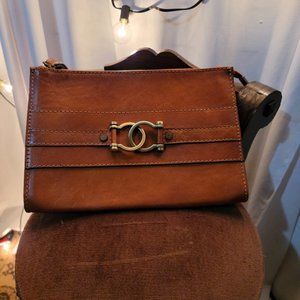 Pratesi clutch wristlet